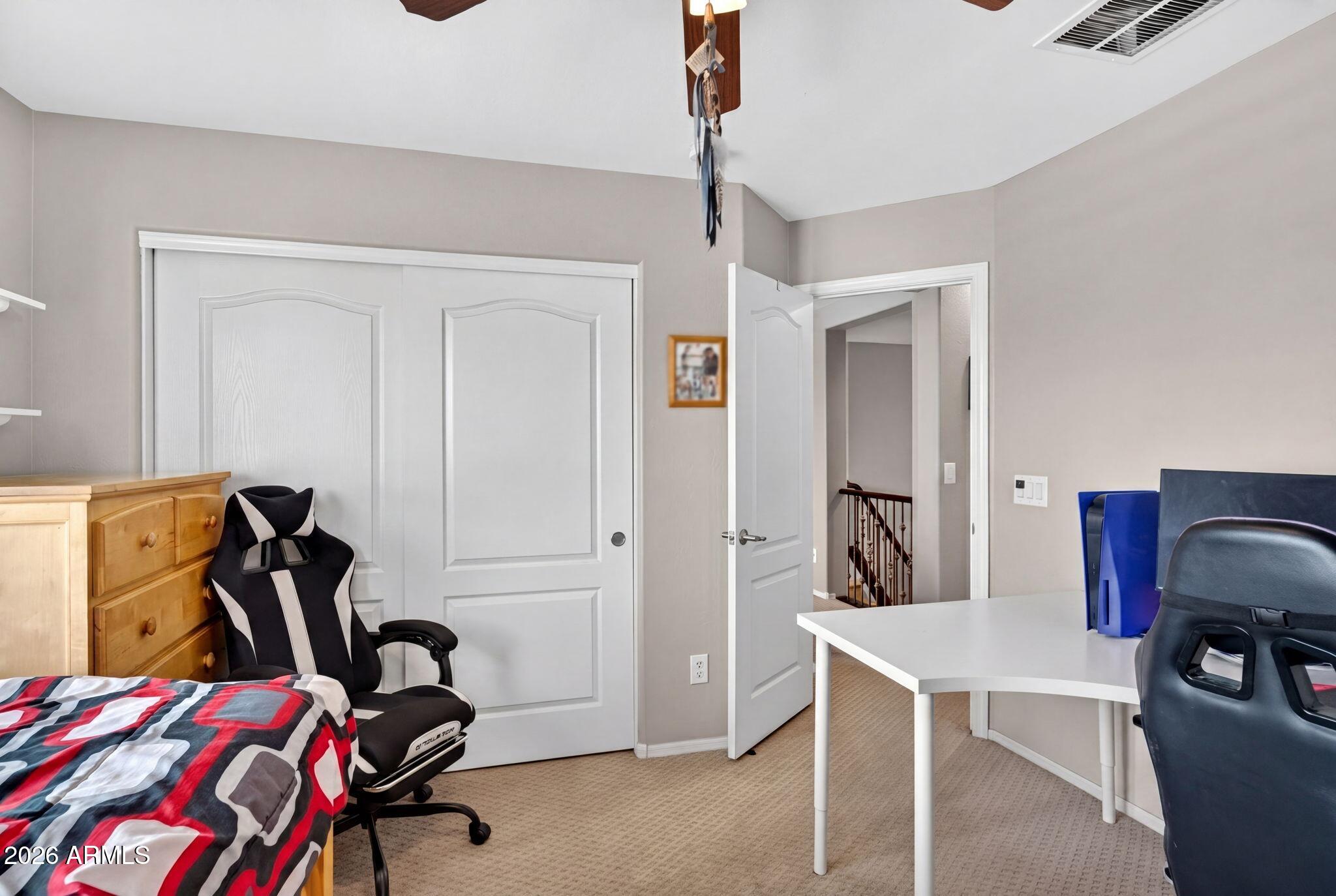 1729 South Reseda Street Gilbert, AZ 85295 - Photo 36 of 52 a view of a workspace with furniture and toys