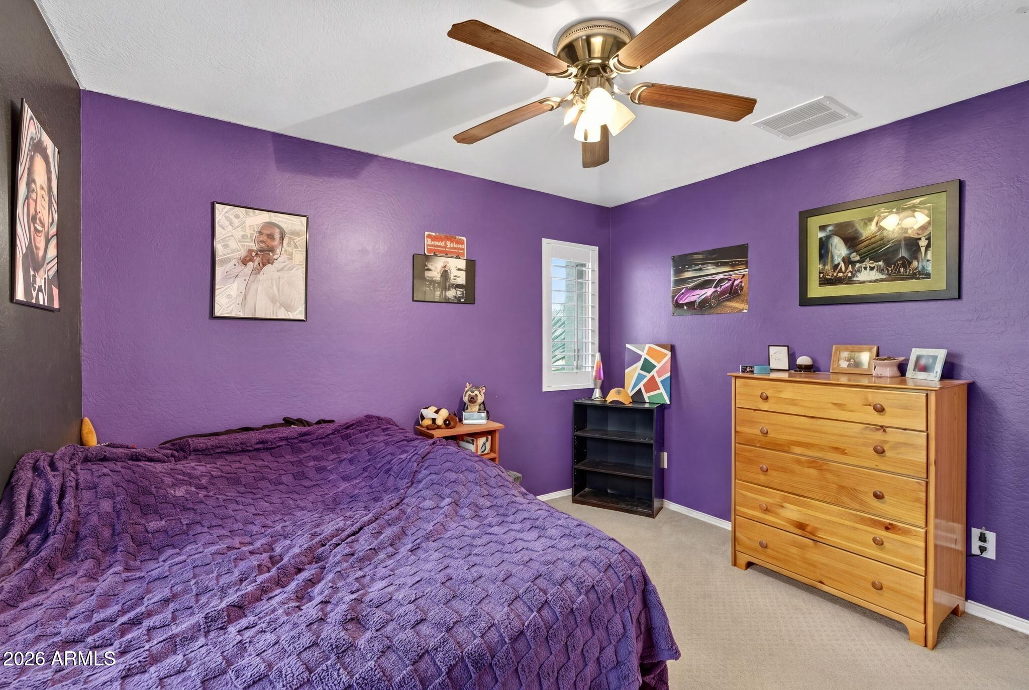 1729 South Reseda Street Gilbert, AZ 85295 - Photo 38 of 52 a bedroom with a bed and a dresser