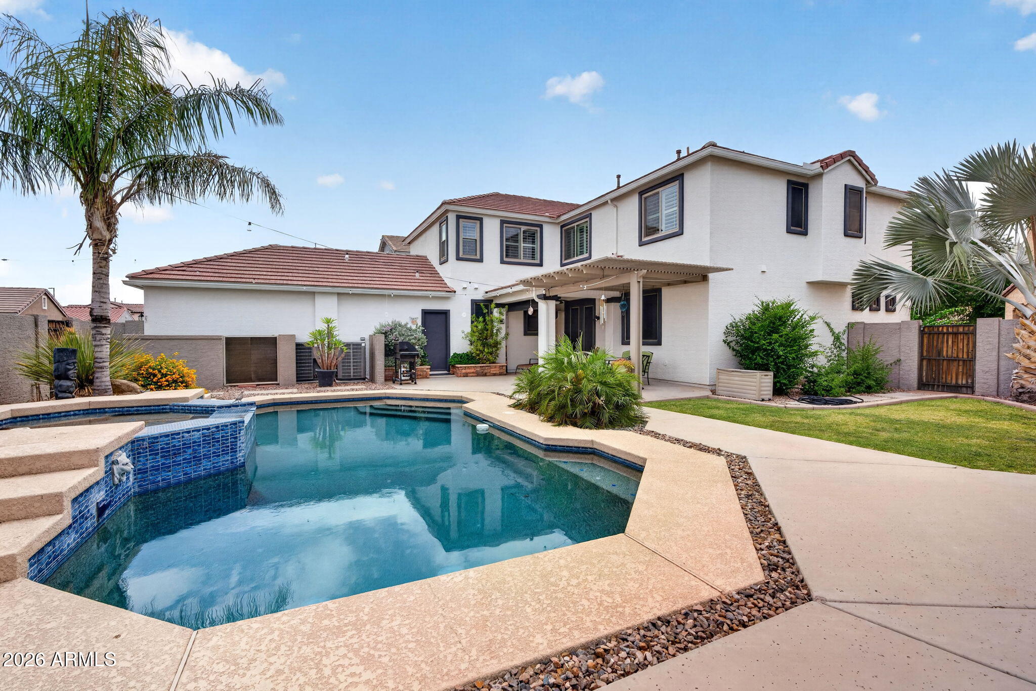 1729 South Reseda Street Gilbert, AZ 85295 - Photo 45 of 52 a view of a house with swimming pool and sitting area