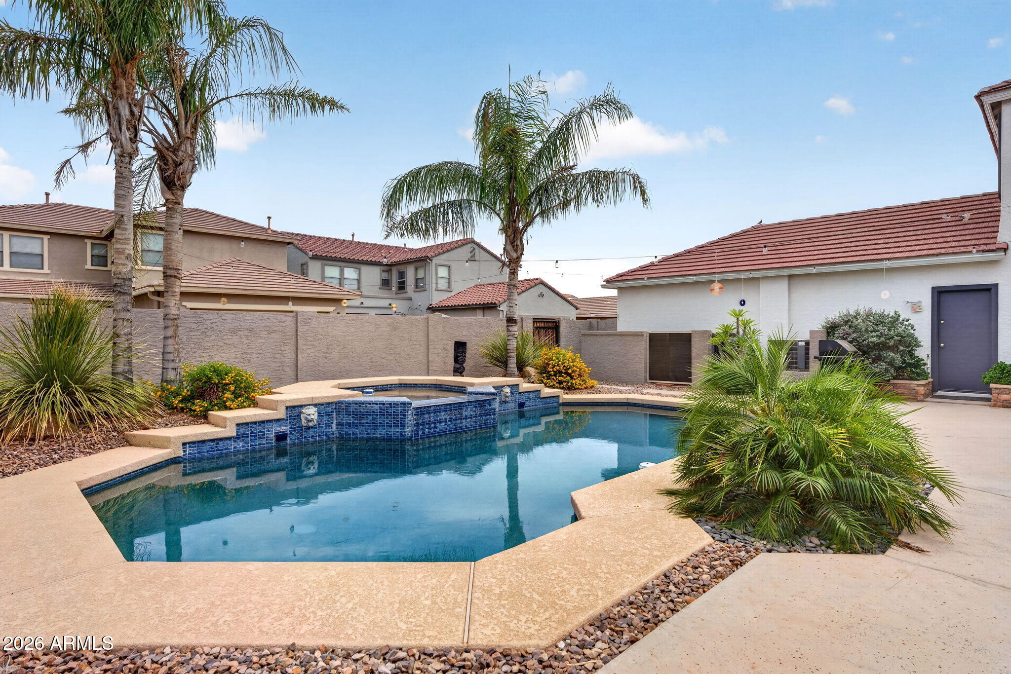 1729 South Reseda Street Gilbert, AZ 85295 - Photo 46 of 52 a view of a house with swimming pool and sitting area