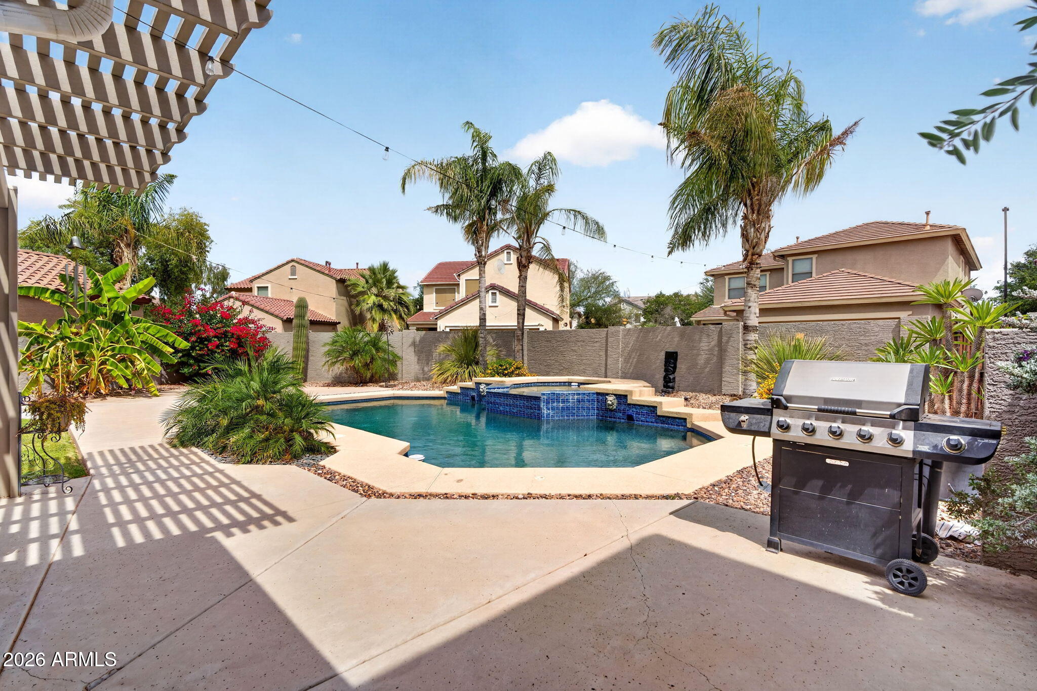 1729 South Reseda Street Gilbert, AZ 85295 - Photo 47 of 52 a view of a swimming pool with a patio