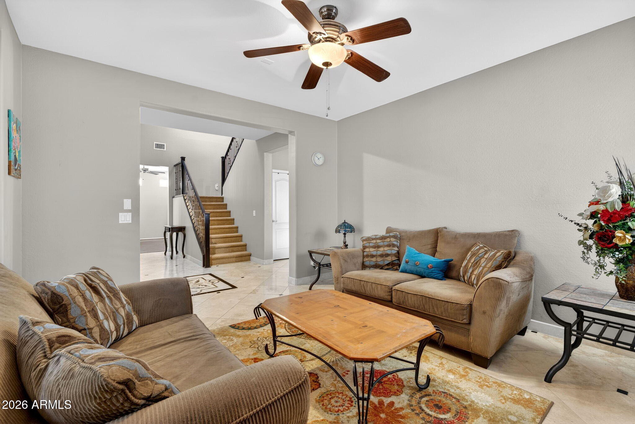 1729 South Reseda Street Gilbert, AZ 85295 - Photo 7 of 52 a living room with furniture and a wooden floor