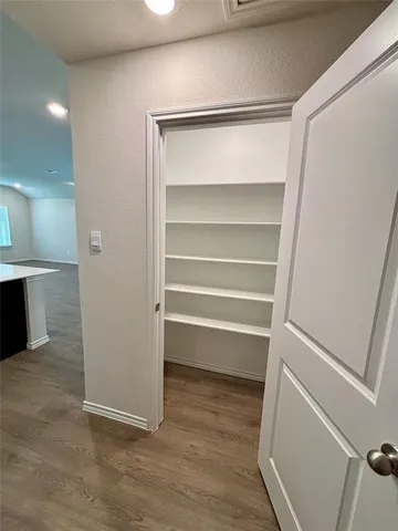 a bathroom with a sink vanity and a mirror