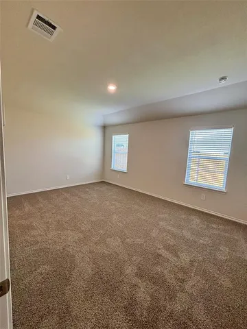 an empty room with a natural light