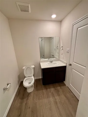 a view of a closet in an empty room