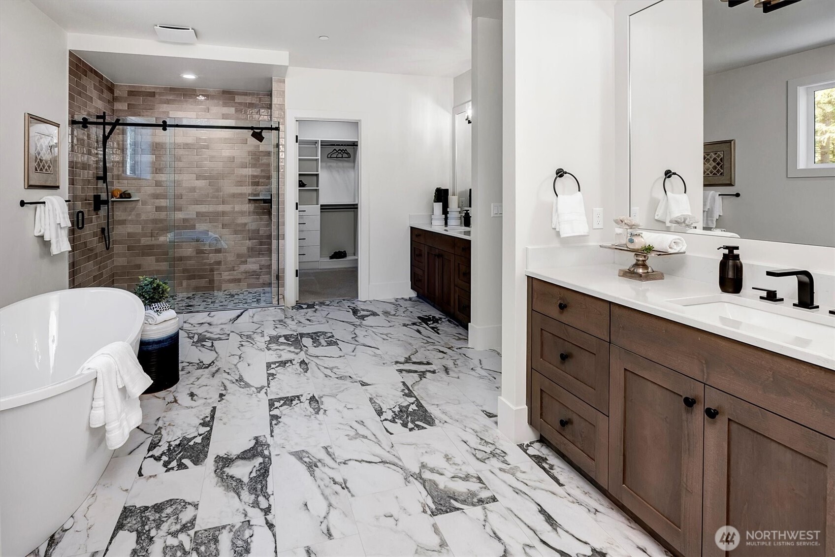 43592 Southeast 145th Street North Bend, WA 98045 - Photo 20 of 22 a bathroom with a sink toilet a mirror and shower