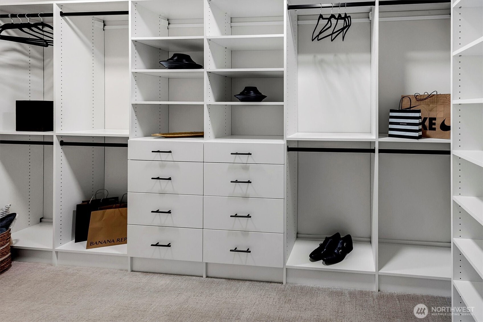 43592 Southeast 145th Street North Bend, WA 98045 - Photo 21 of 22 a view of walk in closet with clothes and shoes