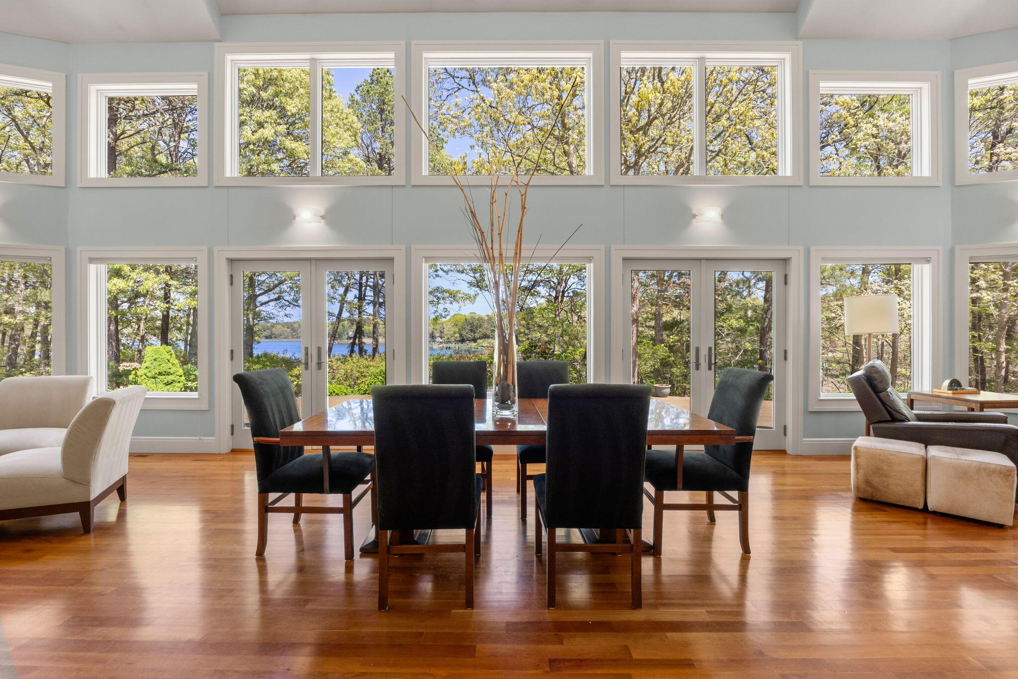 476 Baxter Neck Road Marstons Mills, MA 02648 - Photo 13 of 95 a view of a dining room with furniture large windows and wooden floor