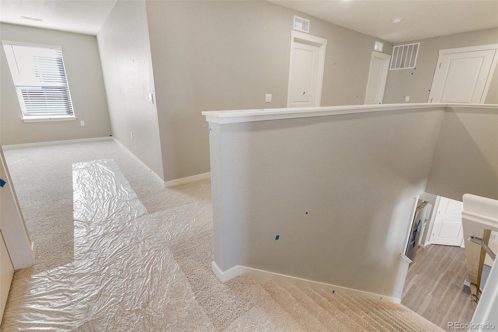 18358 Field Mint Point Parker, CO 80134 - Photo 21 of 34 a view of a bedroom with a bed