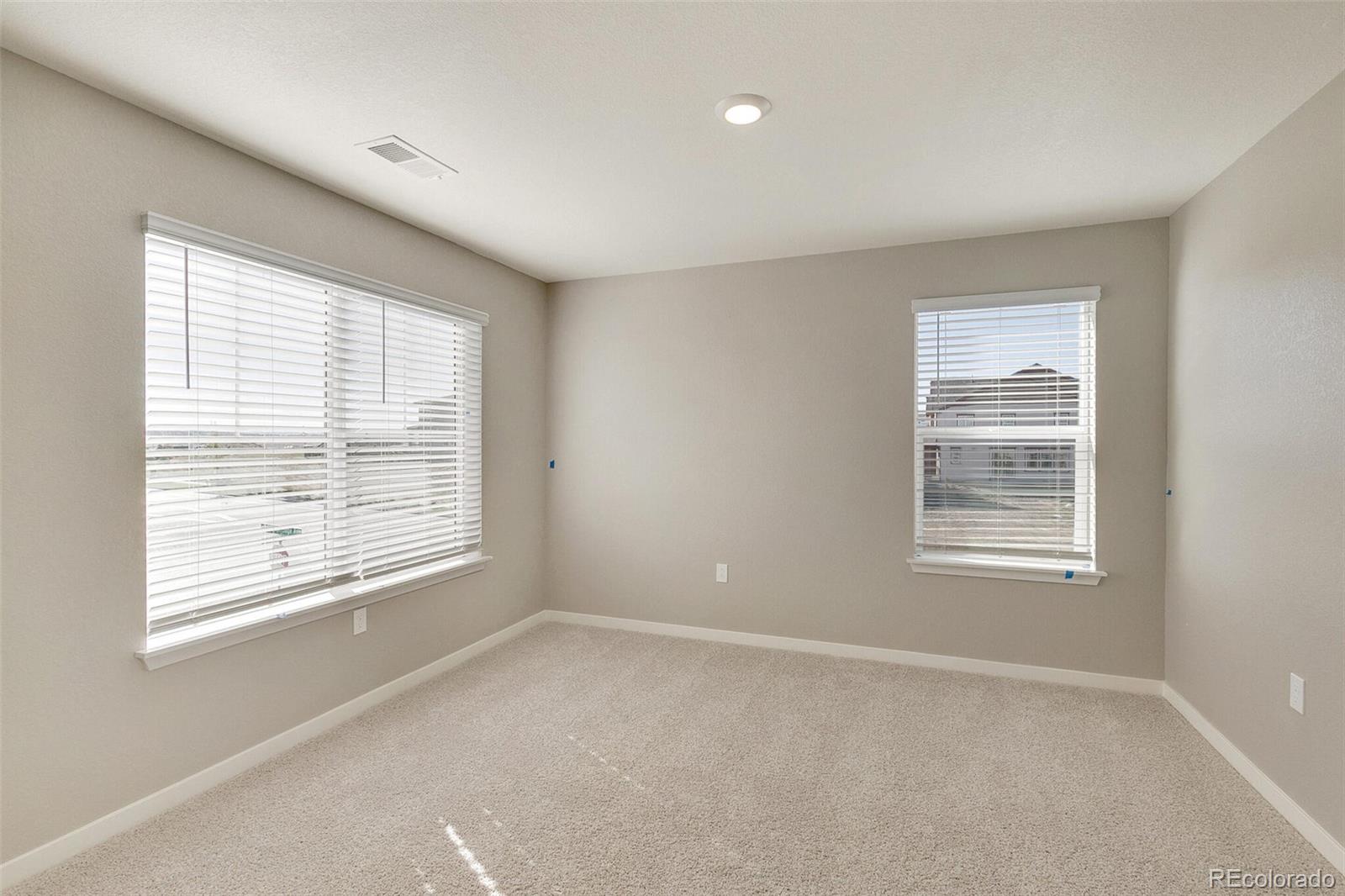 18358 Field Mint Point Parker, CO 80134 - Photo 29 of 34 a view of an empty room with a window