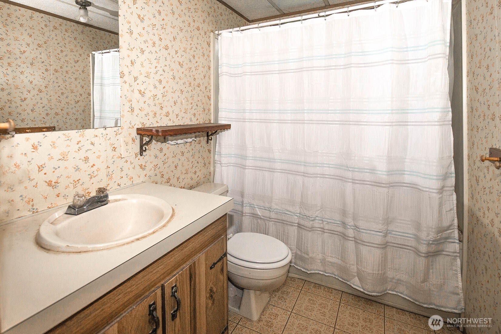 20115 49th Drive Southeast Bothell, WA 98012 - Photo 27 of 35 a bathroom with a sink a toilet and shower