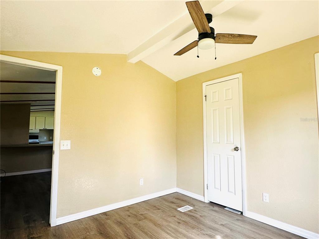 610 Grove Drive Bartow, FL 33830 - Photo 6 of 8 a view of a hallway with wooden floor