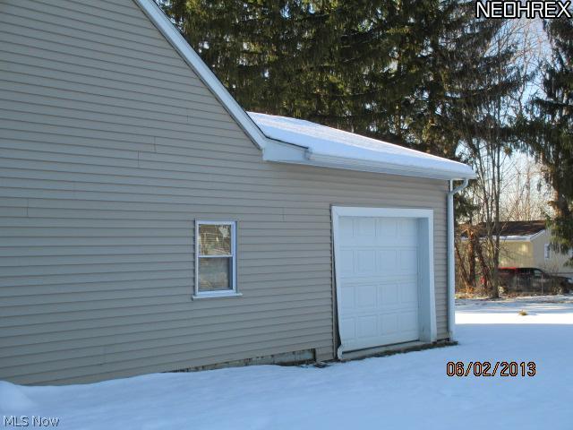 693 Neal Road Akron, OH 44312 - Photo 6 of 14 Extra door on back of garage for easy access.