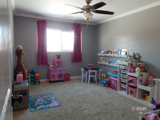 517 Suzanne Street Ridgecrest, CA 93555 - Photo 23 of 34 a children room with toys and toys