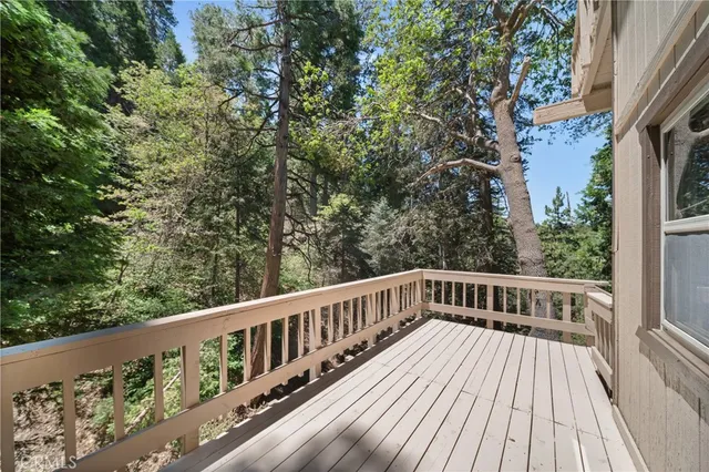 a view of a house with a tree