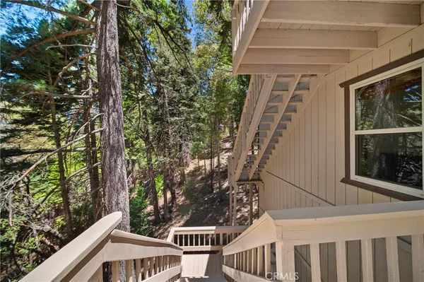 a view of a balcony with an outdoor space