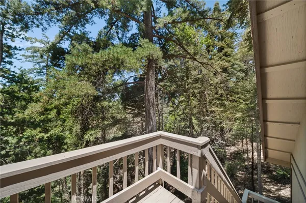 a view of a house with a tree