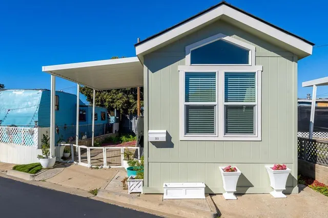 a front view of a house with a porch