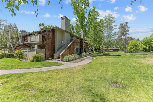 a view of a house with a park