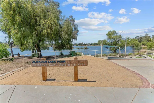 a view of a park with swings and slides