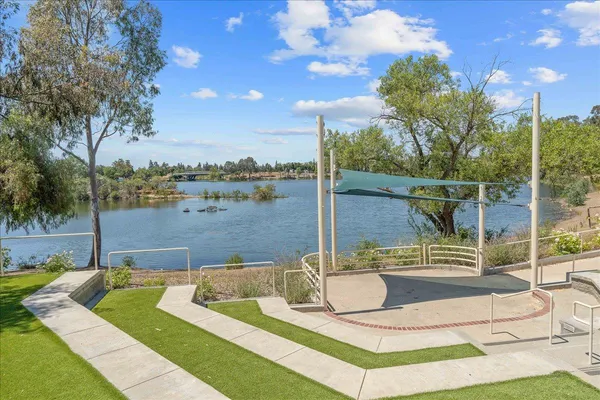 a view of a swimming pool with a patio