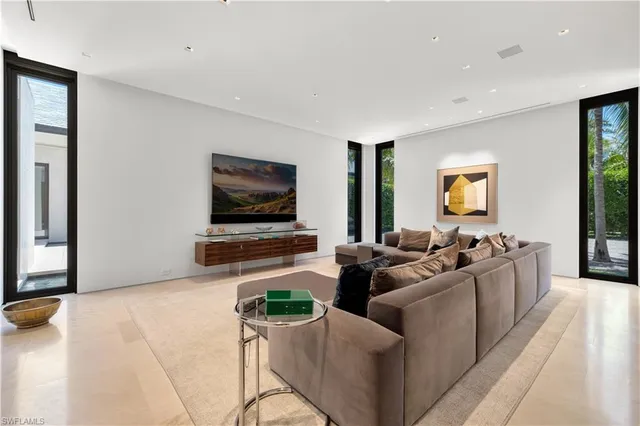 a kitchen with granite countertop a stove and a sink