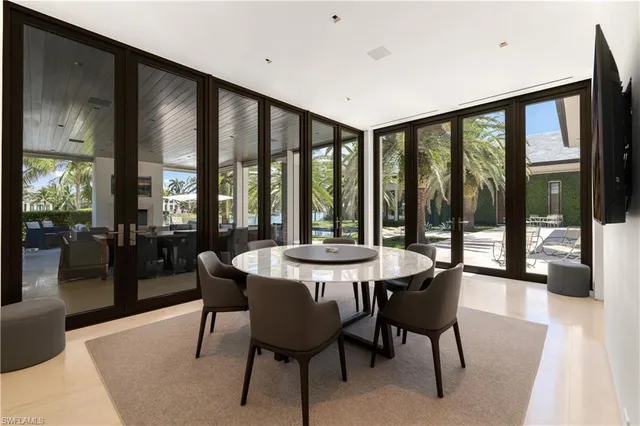 a living room with a bed and furniture