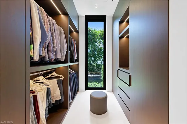 a white bath tub sitting in a bathroom