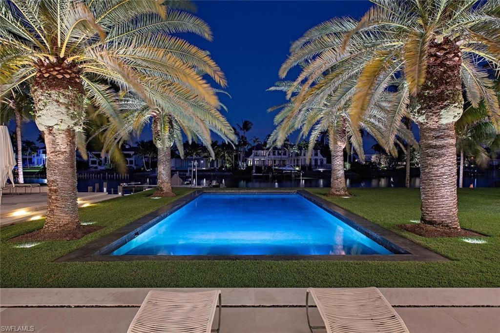 3655 Fort Charles Drive Naples, FL 34102 - Photo 41 of 50 a view of yard with swimming pool