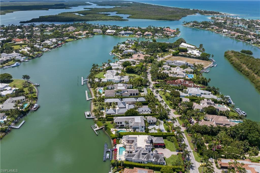 3655 Fort Charles Drive Naples, FL 34102 - Photo 47 of 50 an aerial view of a residential houses with outdoor space