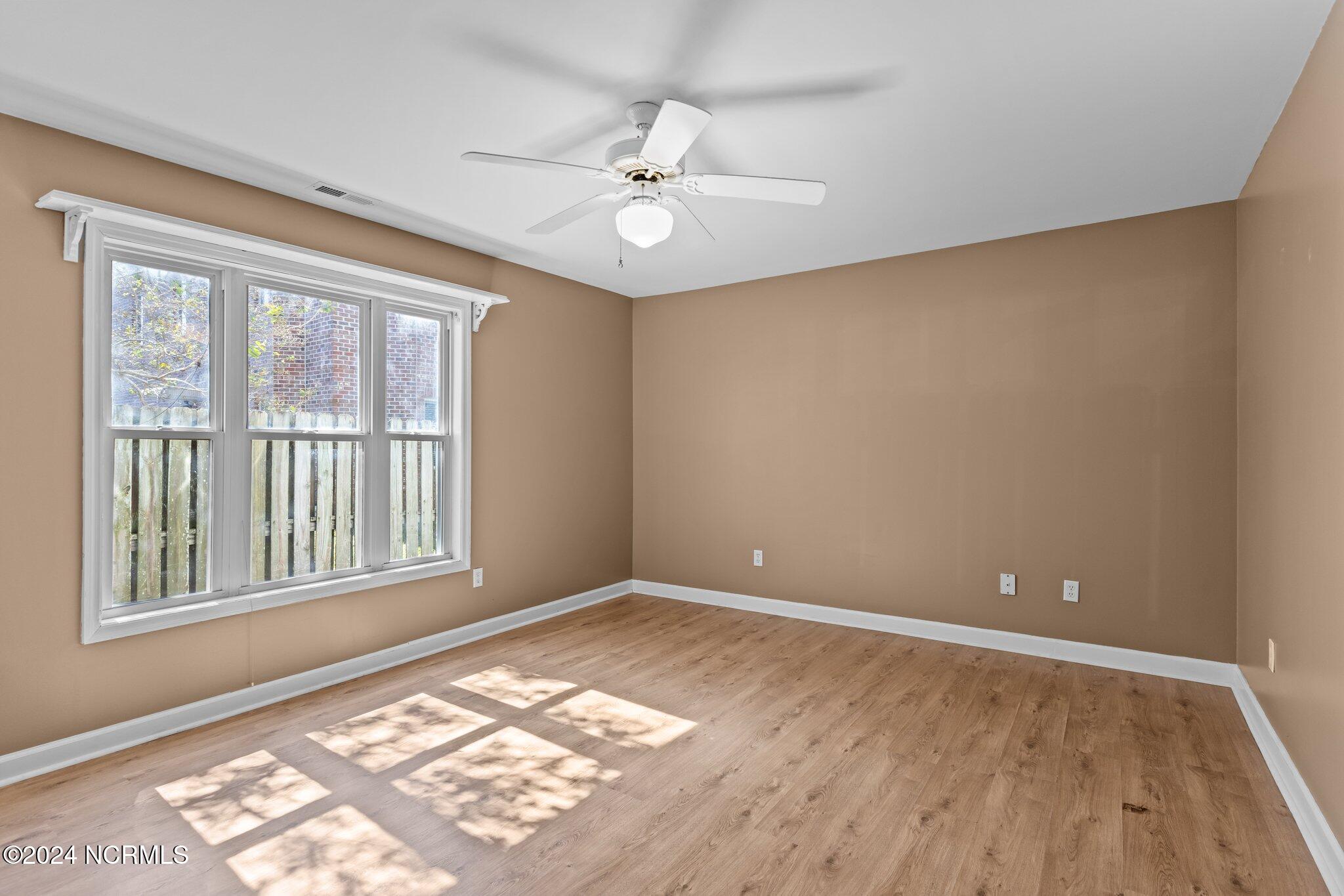 404 Commerce Avenue, Unit B Morehead City, NC 28557 - Photo 17 of 46 Primary Bedroom