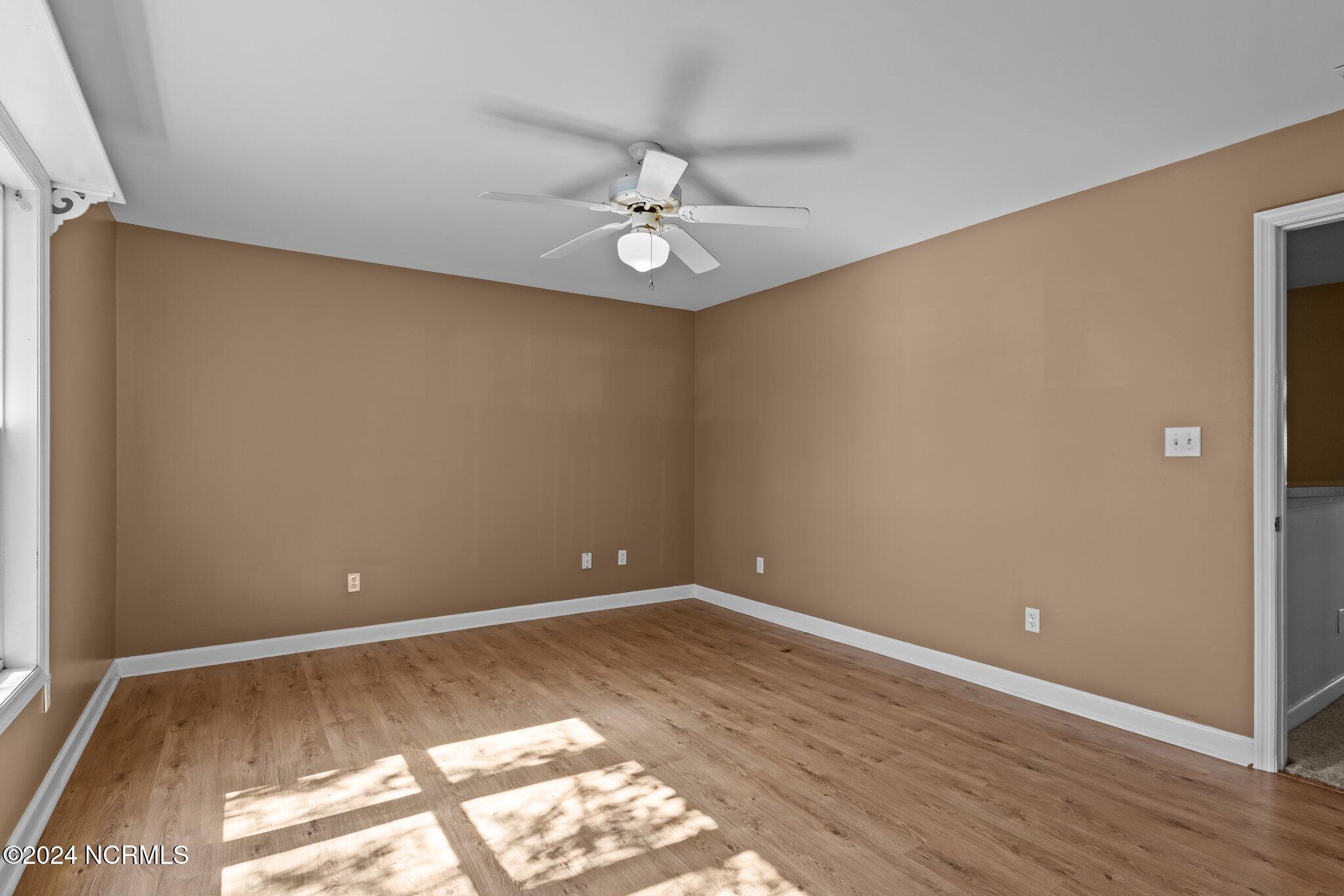 404 Commerce Avenue, Unit B Morehead City, NC 28557 - Photo 18 of 46 Primary Bedroom