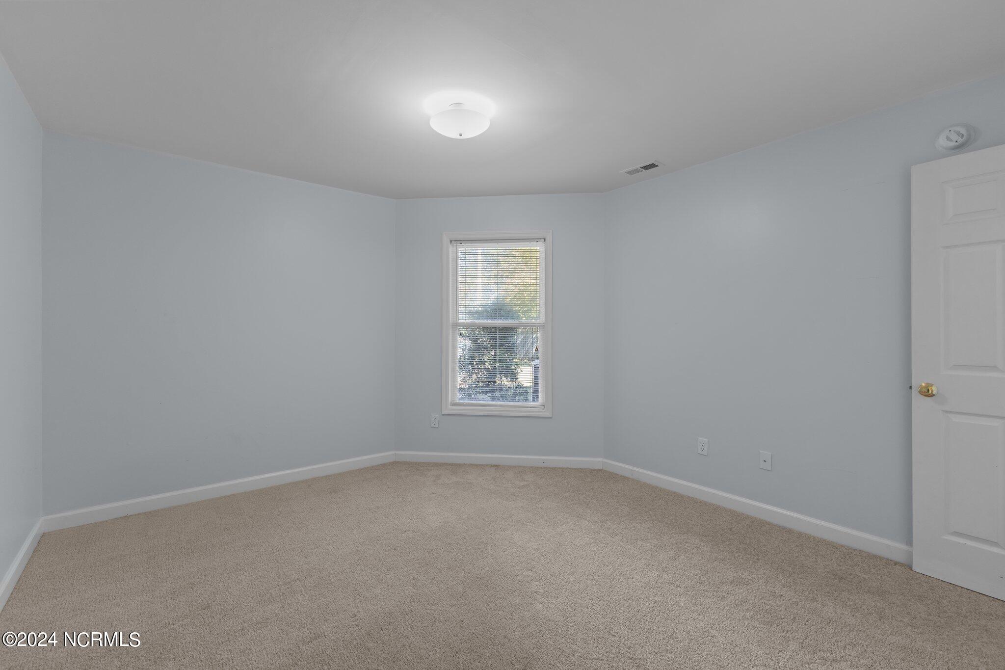 404 Commerce Avenue, Unit B Morehead City, NC 28557 - Photo 26 of 46 2nd Bedroom