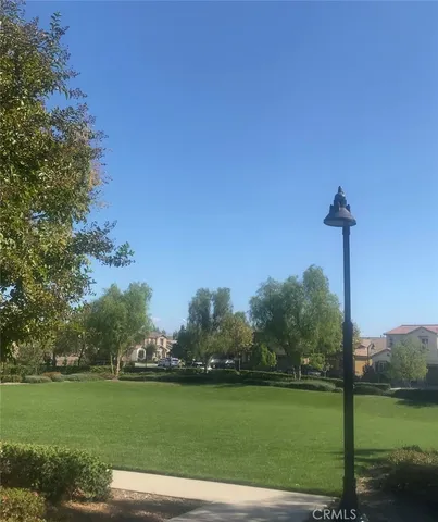 a view of a golf course with a lake