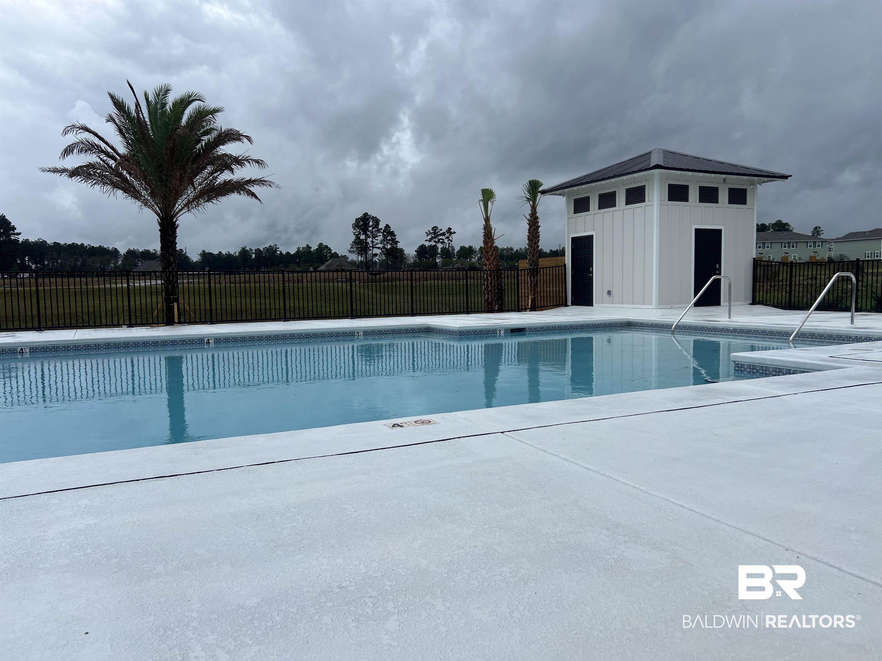 12829 Patriot Way Daphne, AL 36527 - Photo 33 of 38 View of swimming pool featuring a patio