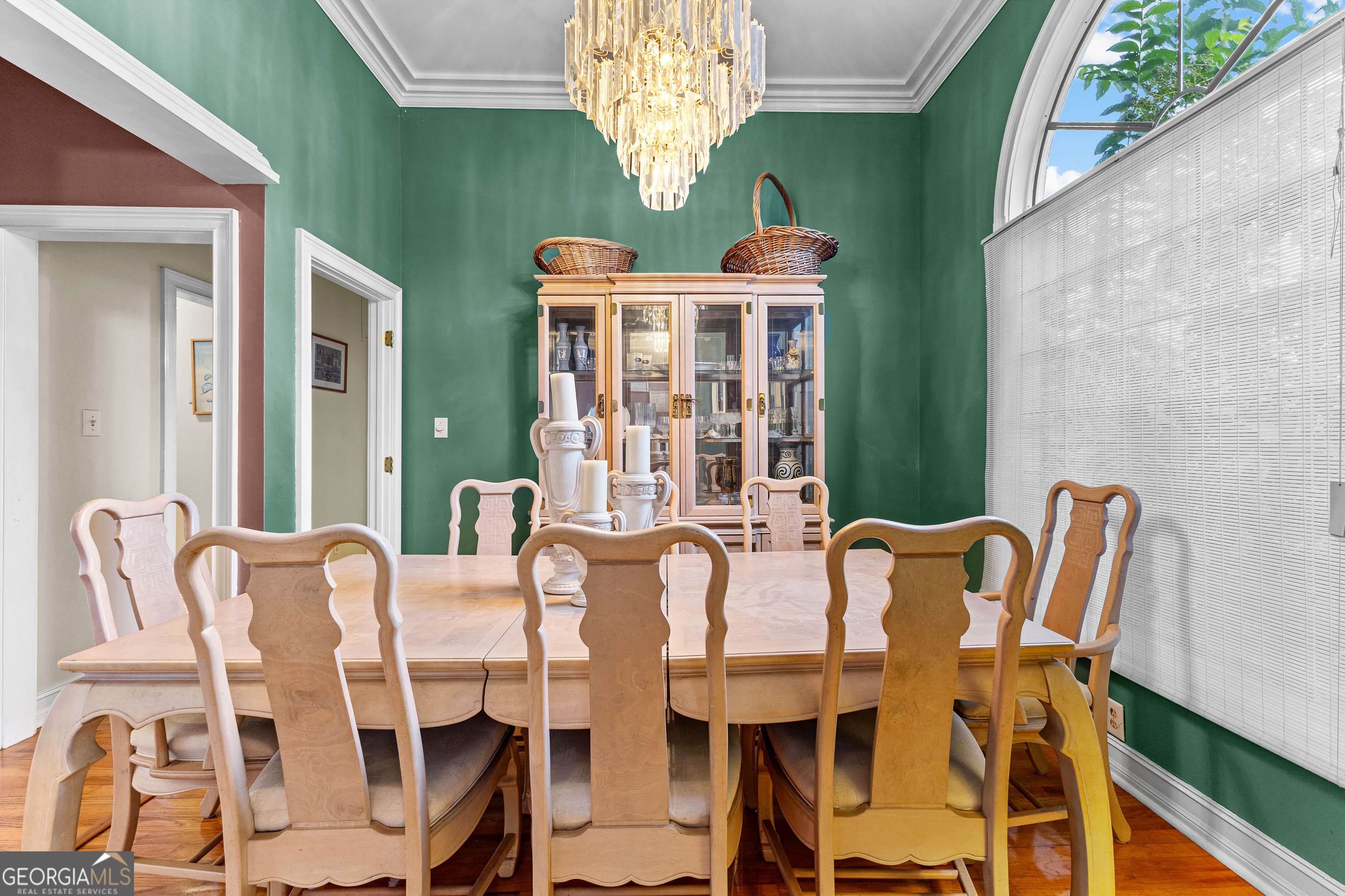 502 North Rover Road Williamson, GA 30292 - Photo 3 of 46 a view of a dining room with furniture and chandelier