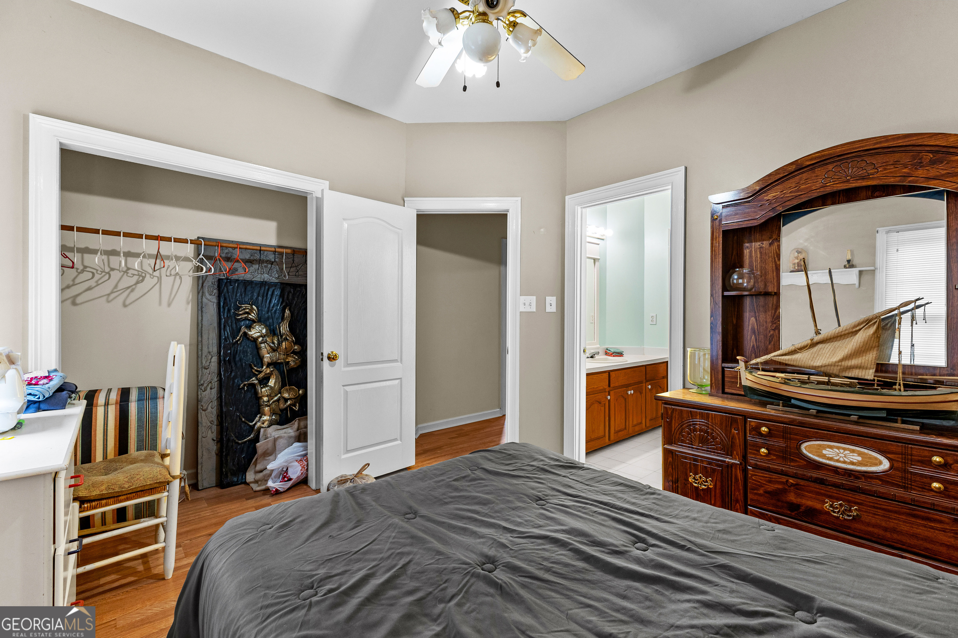 502 North Rover Road Williamson, GA 30292 - Photo 31 of 46 a bedroom with a bed and a mirror on the dresser