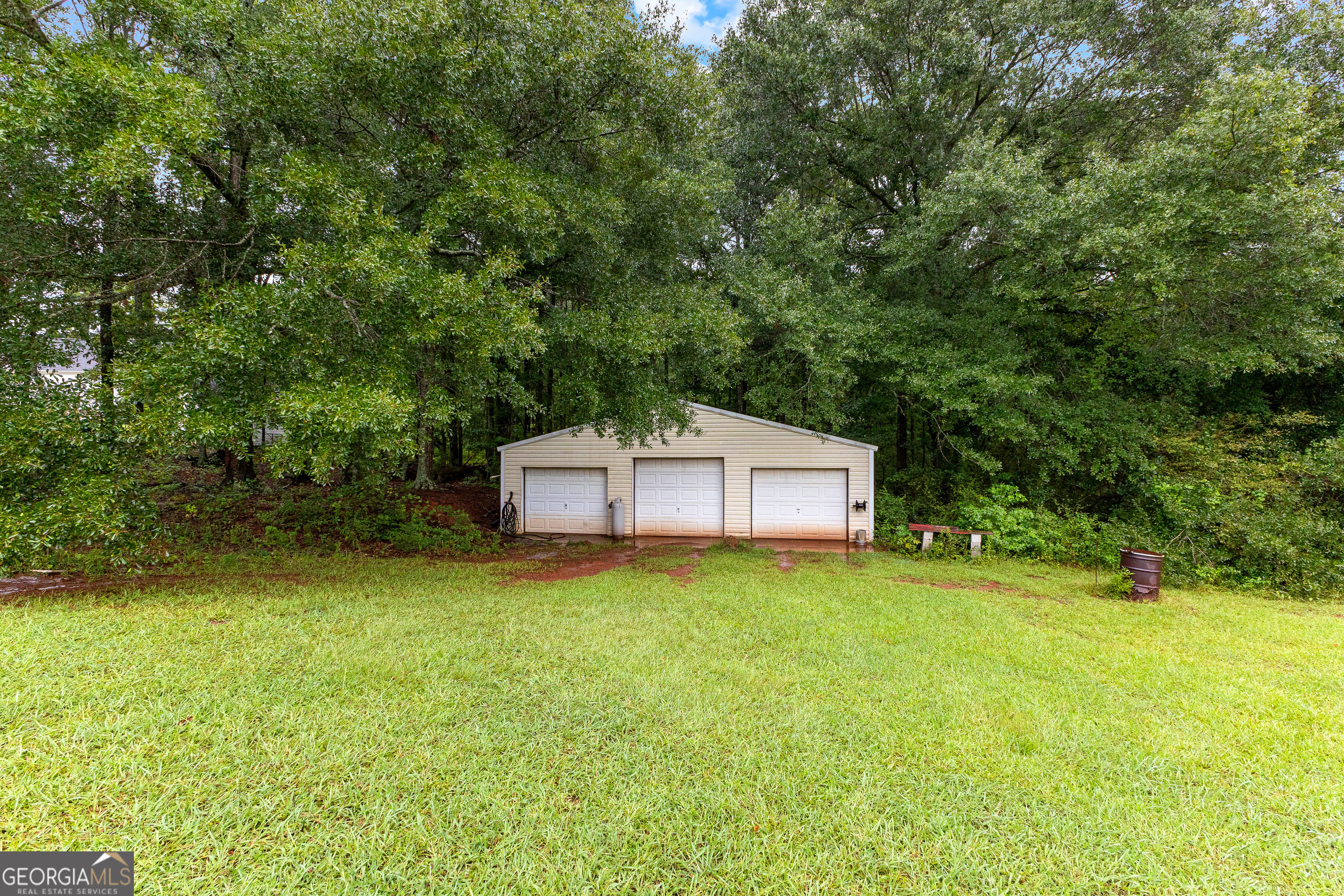 502 North Rover Road Williamson, GA 30292 - Photo 4 of 46 a house view with a outdoor space