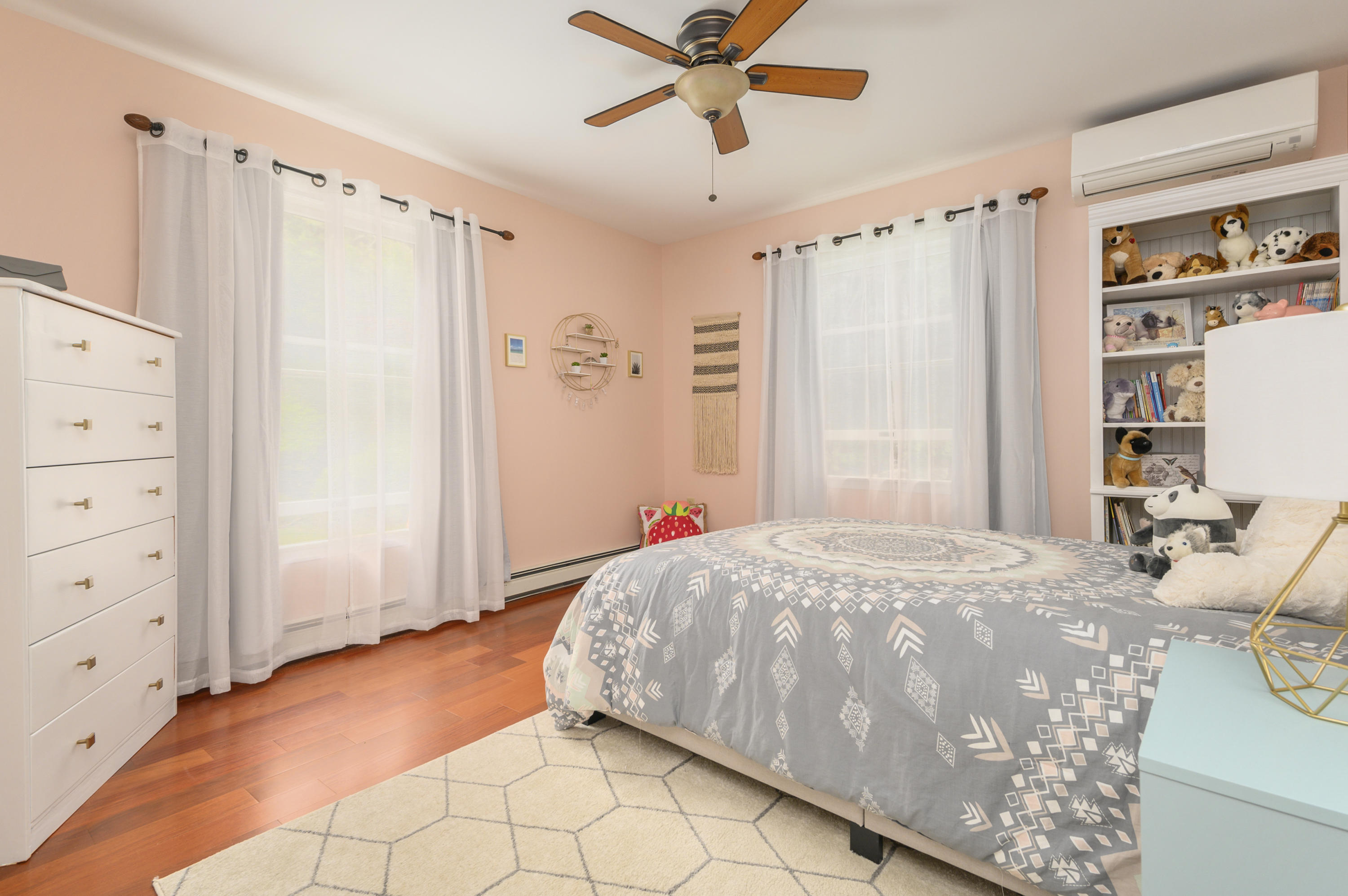 60 Truro Center Road Truro, MA 02666 - Photo 14 of 30 a bedroom with a bed and a window