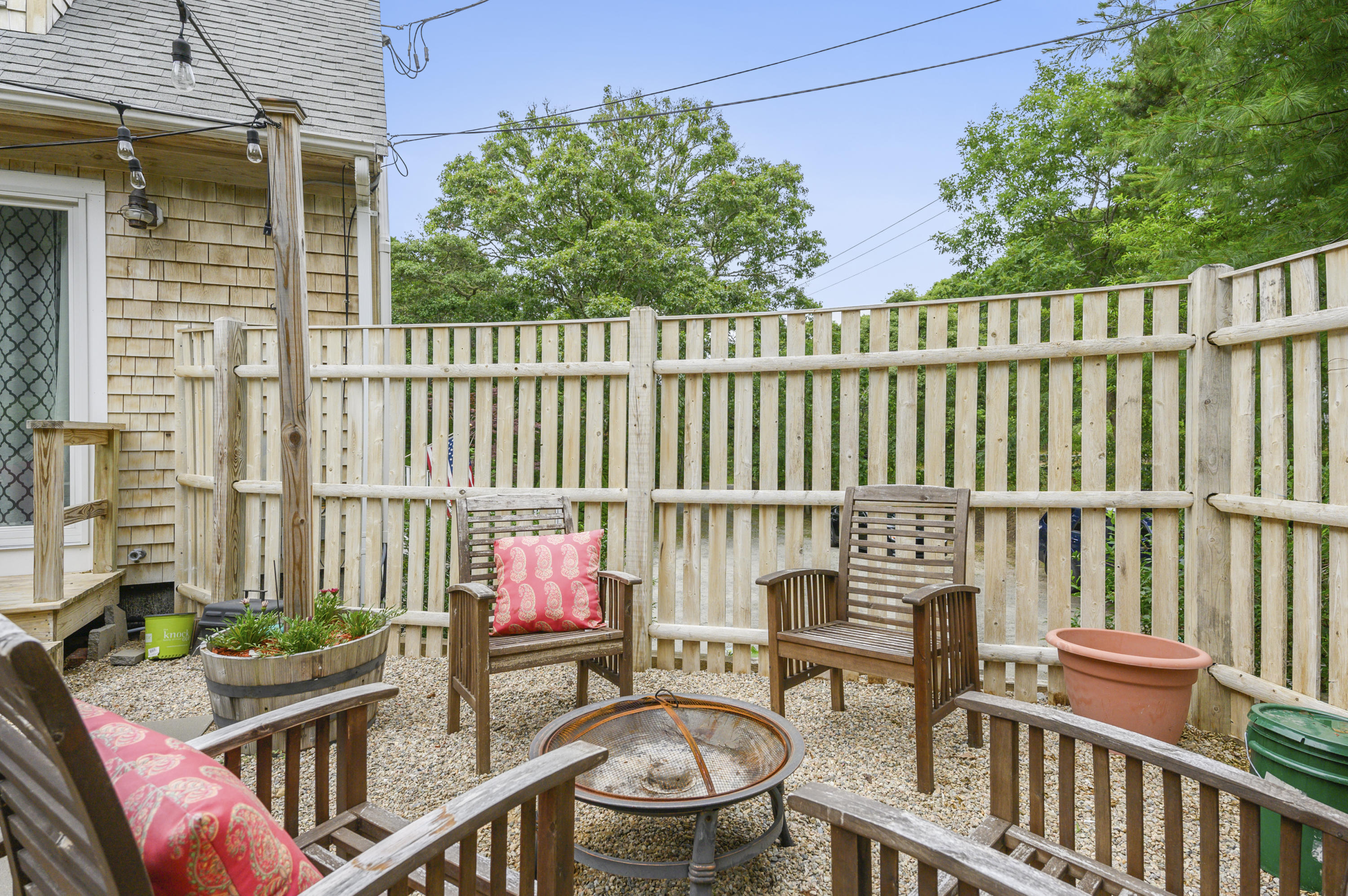 60 Truro Center Road Truro, MA 02666 - Photo 25 of 30 a view of a chairs and table in the balcony