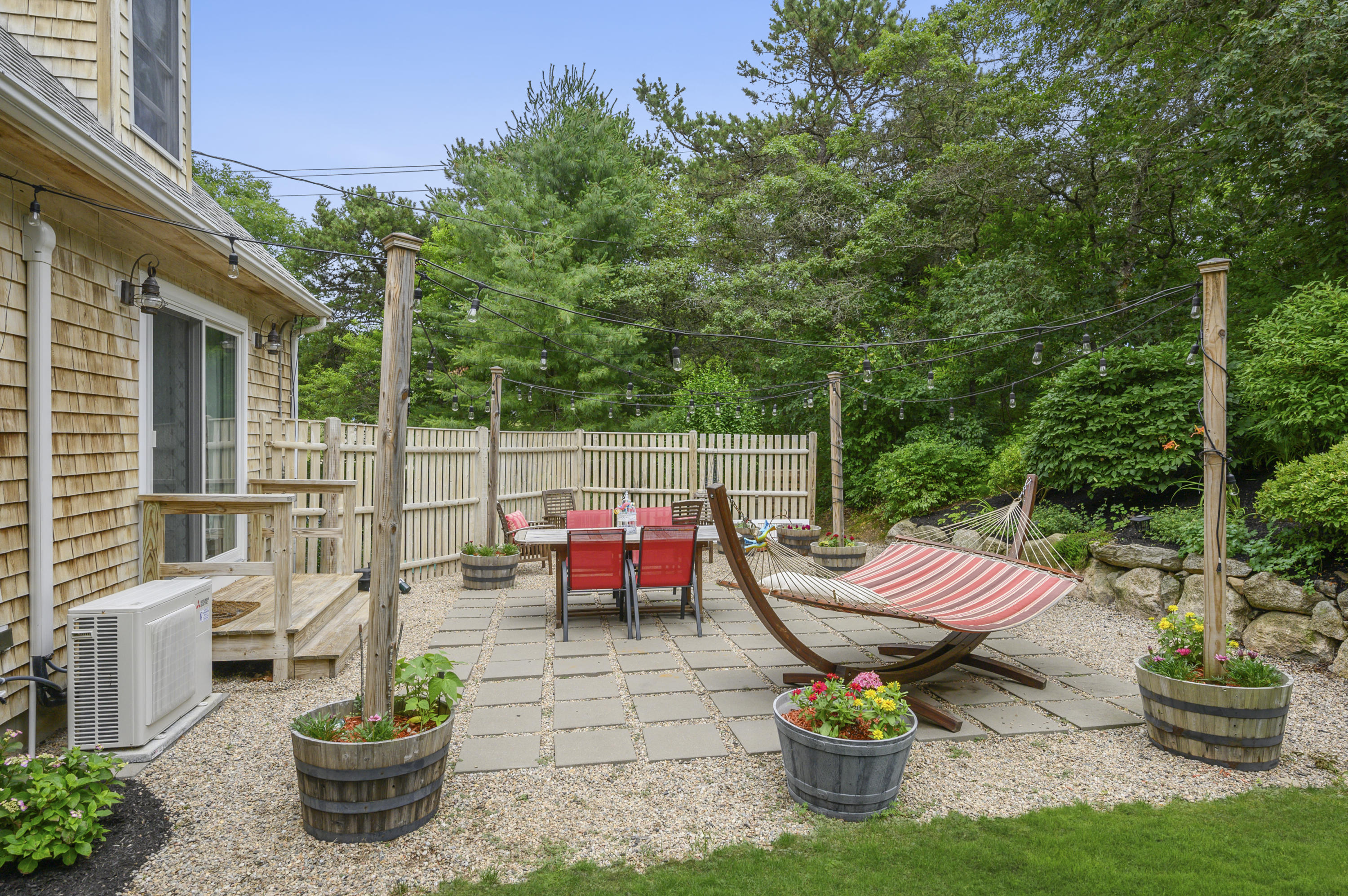 60 Truro Center Road Truro, MA 02666 - Photo 28 of 30 a view of a patio with chairs and plants