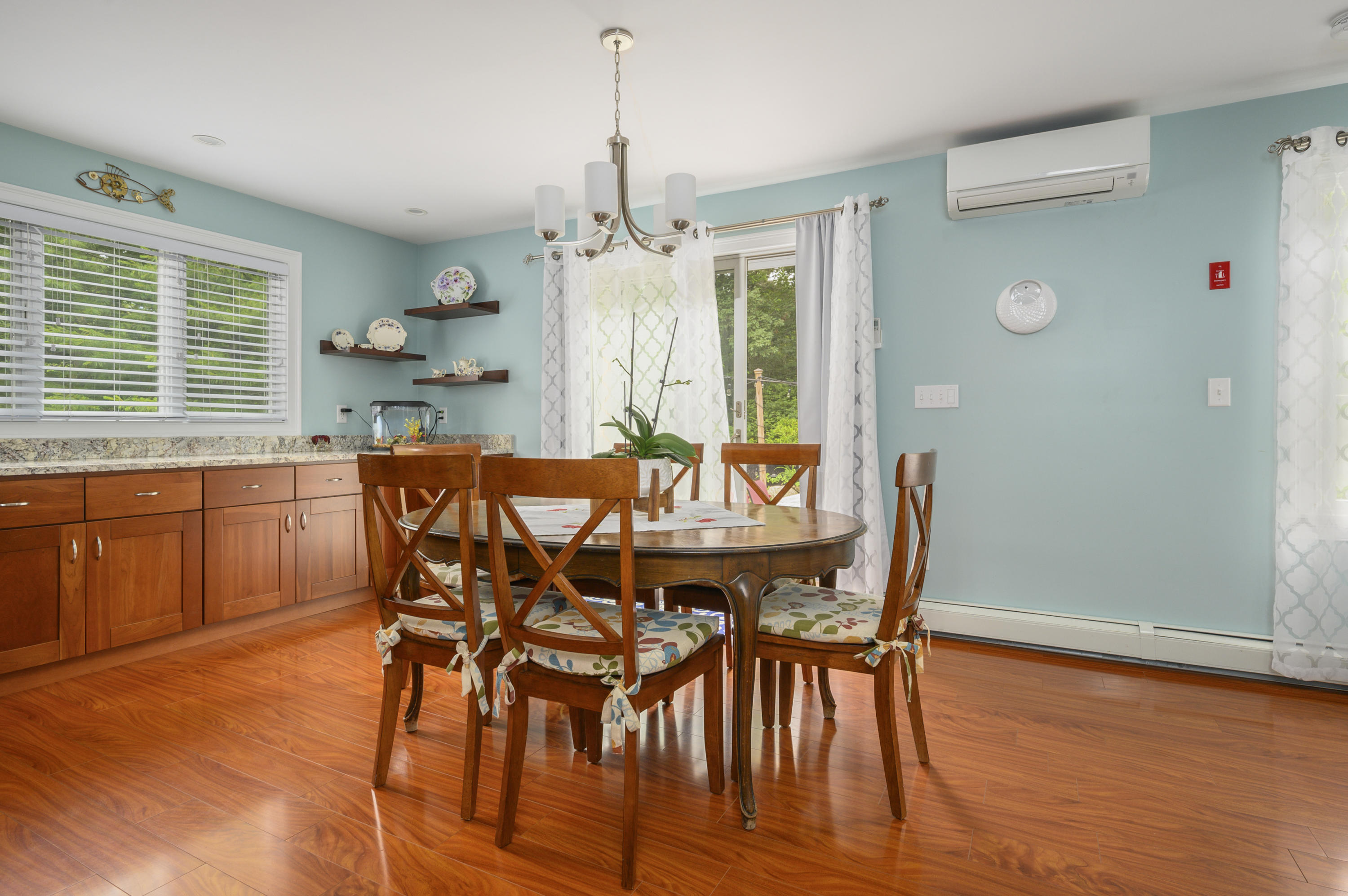 60 Truro Center Road Truro, MA 02666 - Photo 6 of 30 a view of a dining room with furniture window and wooden floor