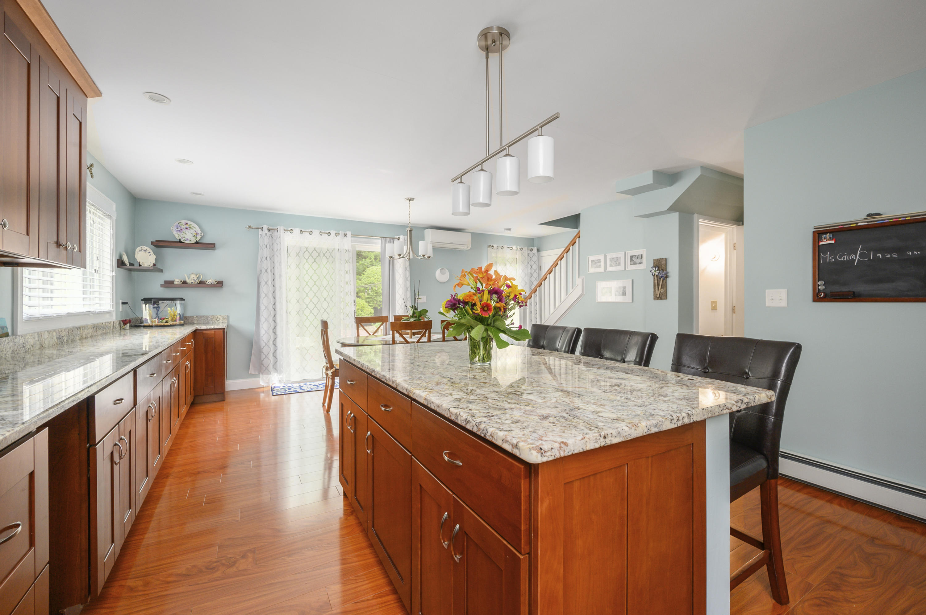60 Truro Center Road Truro, MA 02666 - Photo 10 of 30 a kitchen with stainless steel appliances granite countertop a kitchen island a stove and a sink