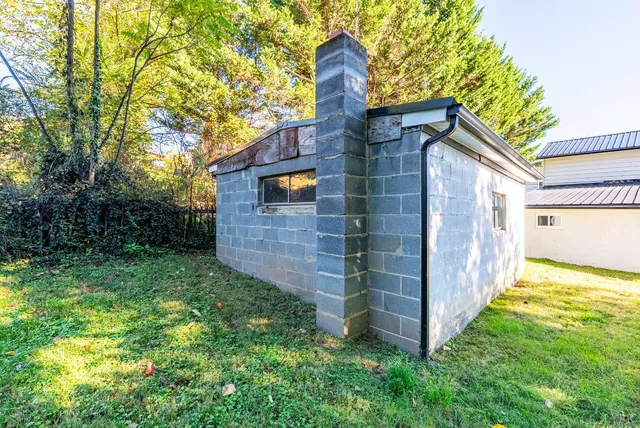 a backyard of a house with lots of green space