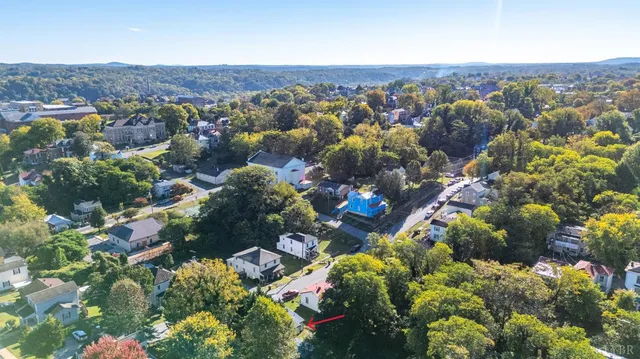 a picture of a bench in a white wall