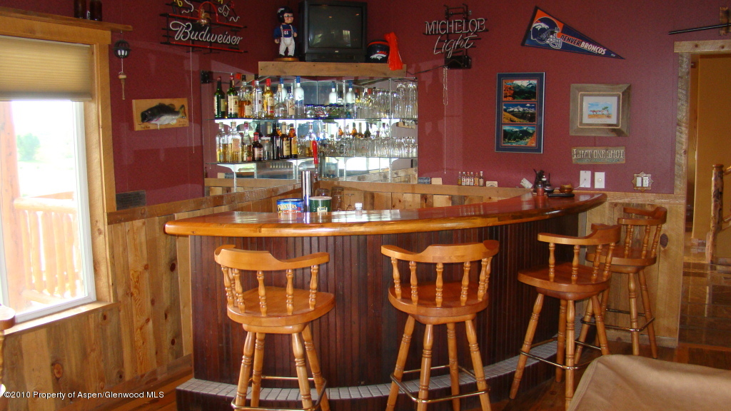 3799 County Road 233 Rifle, CO 81650 - Photo 18 of 23 Lower level bar