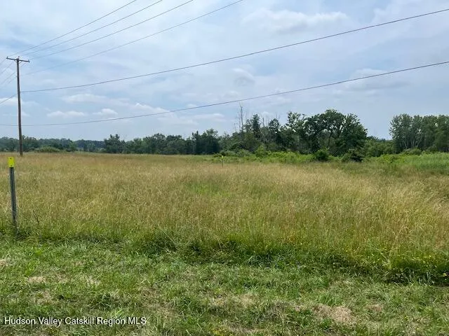 a view of a lake with a mountain in the background