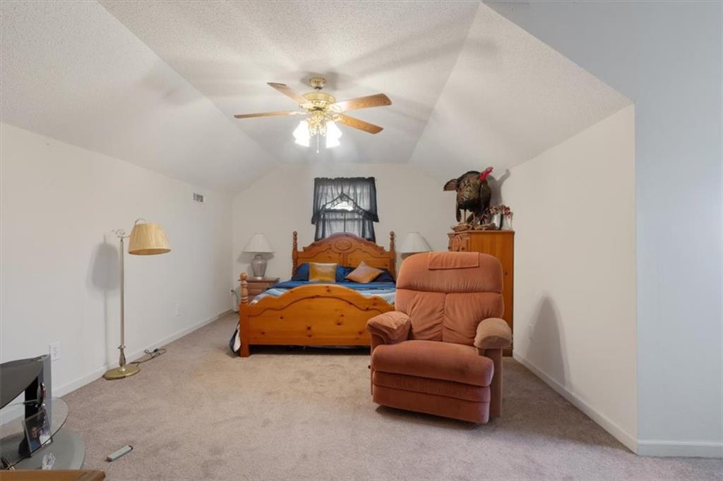 871 Robinson Road Chatsworth, GA 30705 - Photo 18 of 25 a bedroom with bed and window