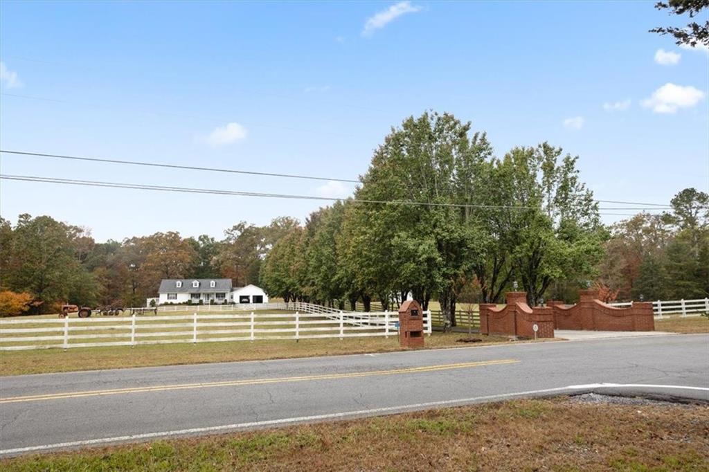 871 Robinson Road Chatsworth, GA 30705 - Photo 23 of 25 a view of a yard with a trampoline