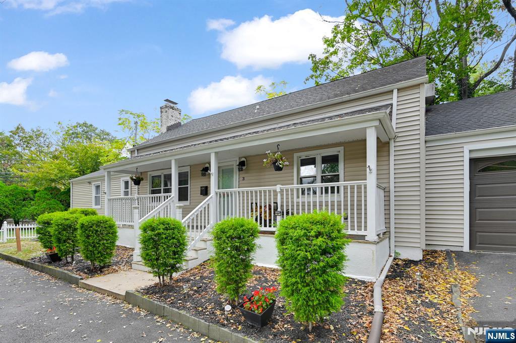 3 Country Club Road Livingston, NJ 07039 - Photo 4 of 37 a view of a house with potted plants